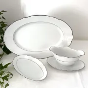 3 white porcelain plates