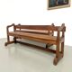 Pair of communal benches in solid oak, 1950s.