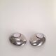 Pair of Nuance candle holders in the shape of pebbles.
