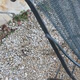 Relaxed wrought iron chair