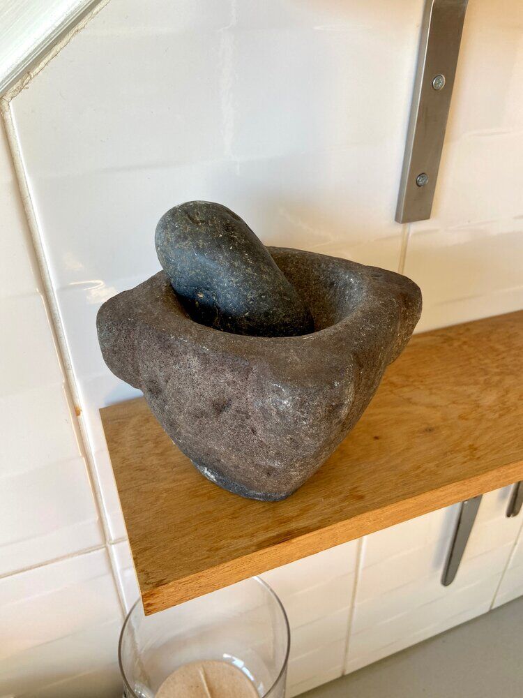 Mortar and pestle in black stone