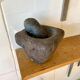 Mortar and pestle in black stone