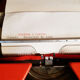 Portable typewriter " Olympia traveller de luxe " , red , in working order