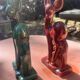 Pair of Art Deco deer by Charles Lemanceau in red and green ceramic.