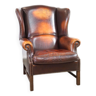 Fauteuil à oreilles classique et majestueux en cuir de mouton avec de jolies couleurs