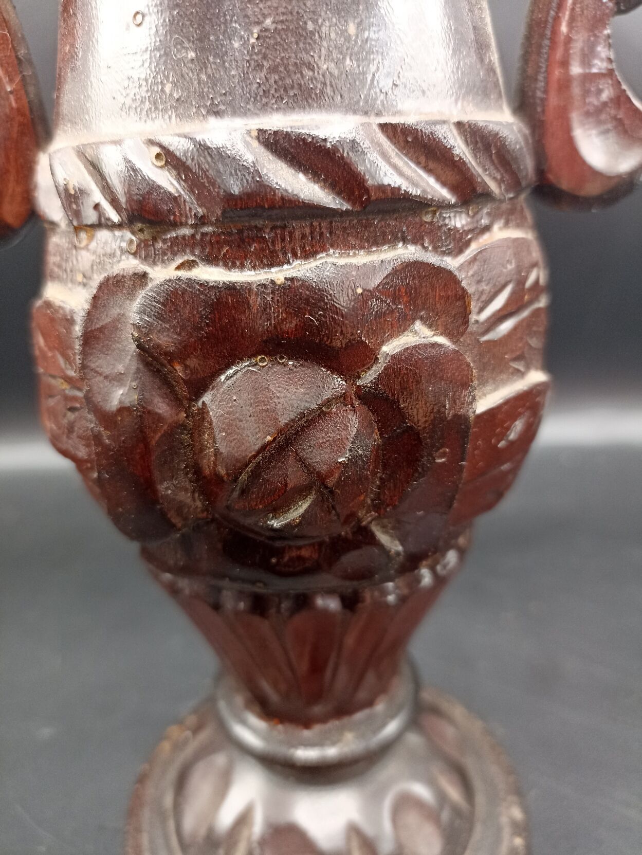 Carved wood amphora vase varnished