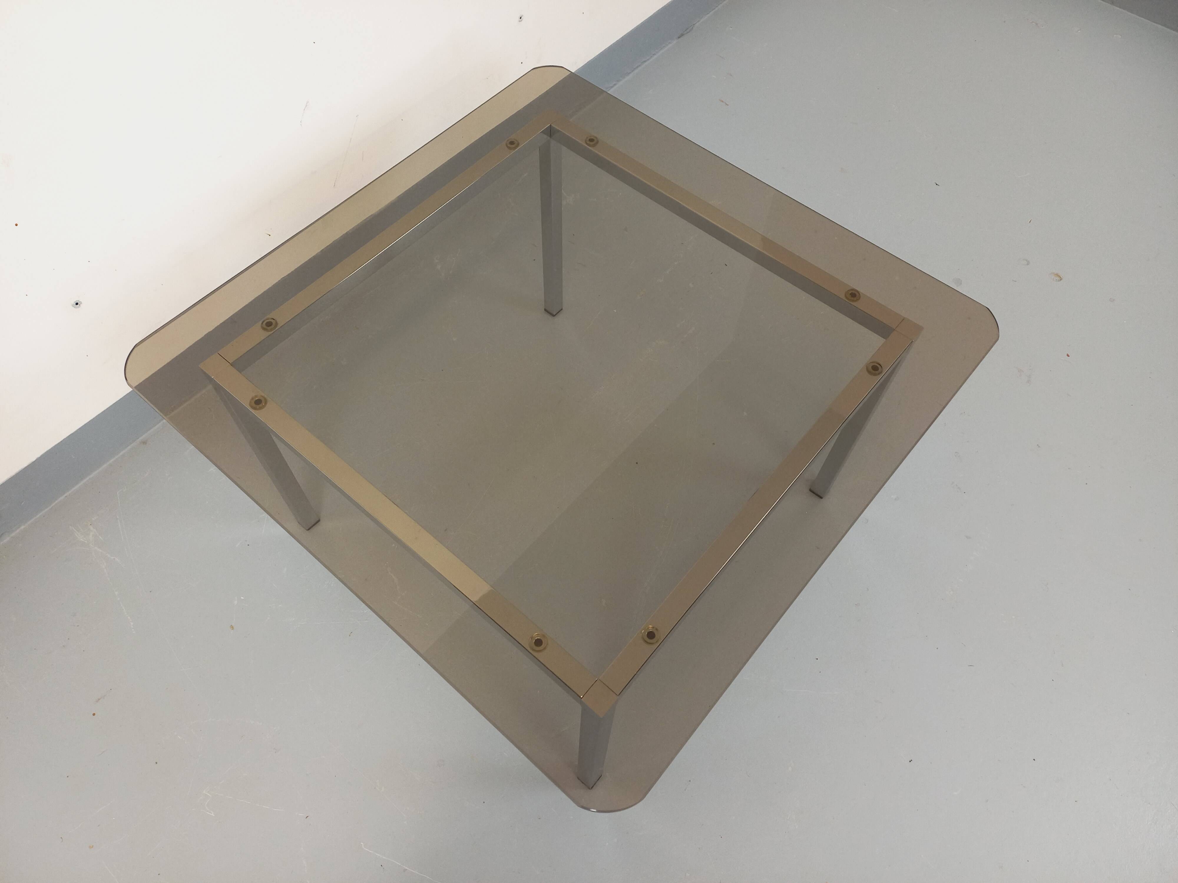 Vintage square coffee table in smoked glass and chrome metal from the 1970s.