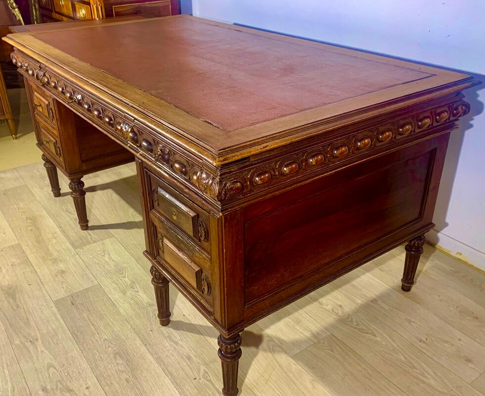 Renaissance style desk in solid oak, richly carved