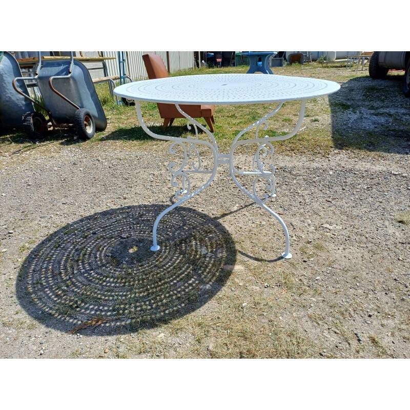 Wrought iron garden table, circa 1900