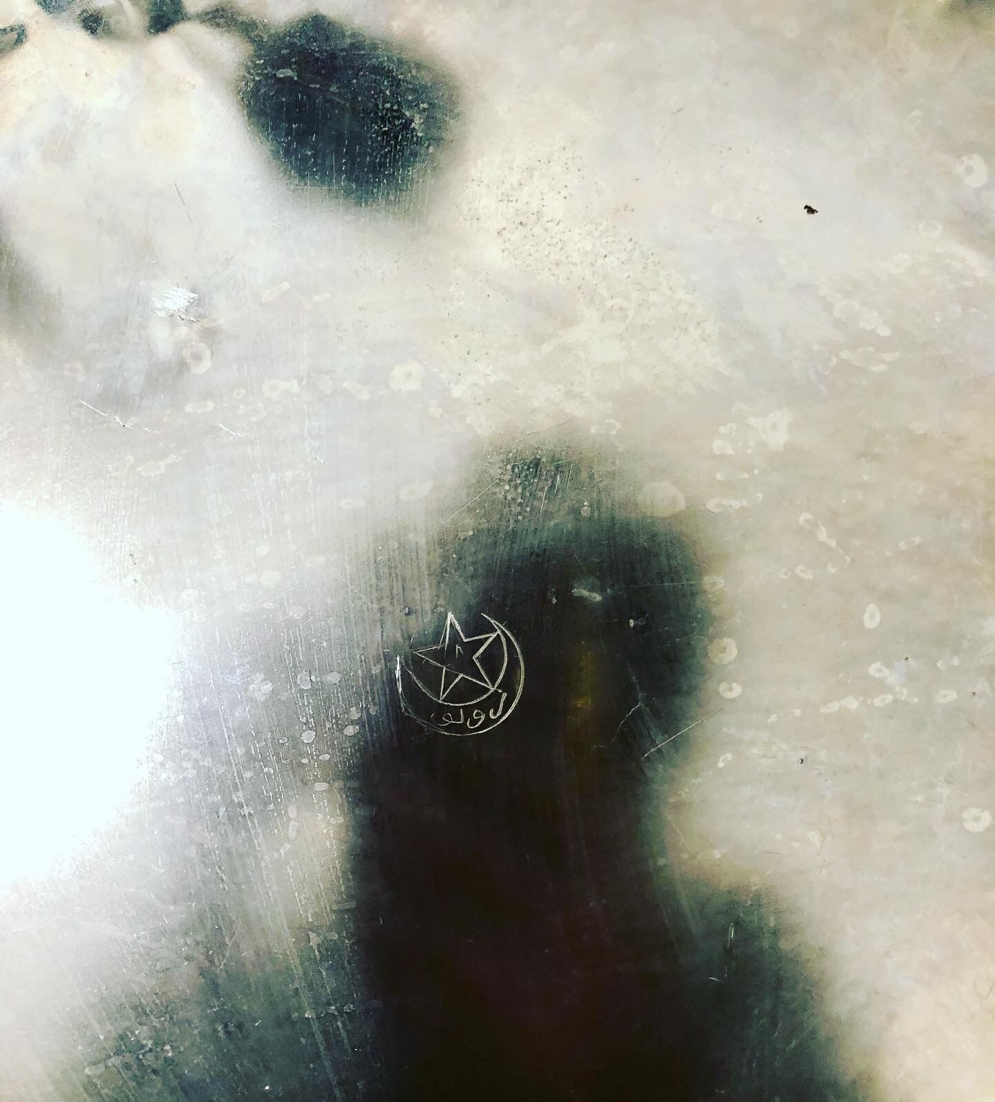 Oriental silver metal top