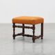 Louis XIII walnut stool with carved turned stretchers and upholstered seat