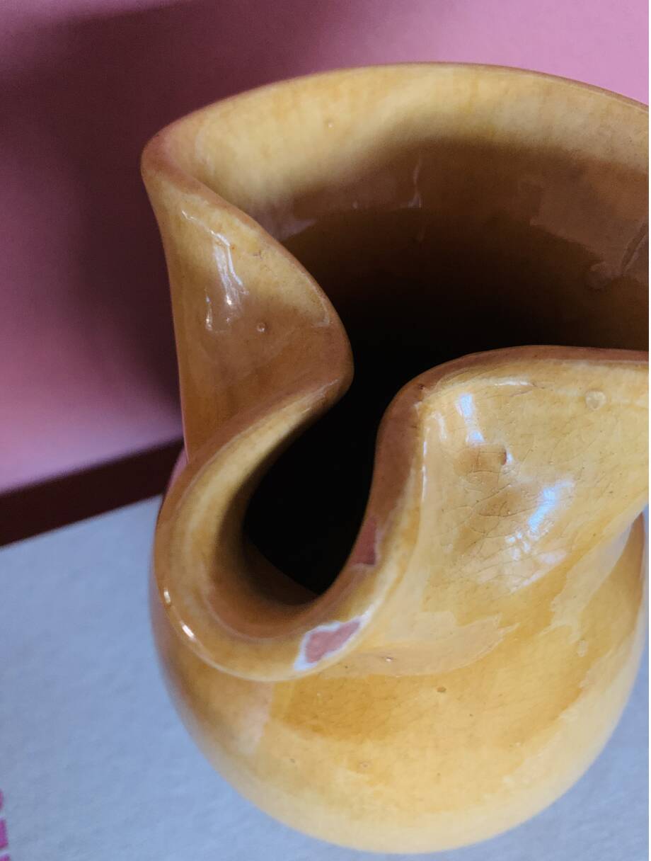 Large vintage artisanal glazed earthenware pitcher with pinched spout