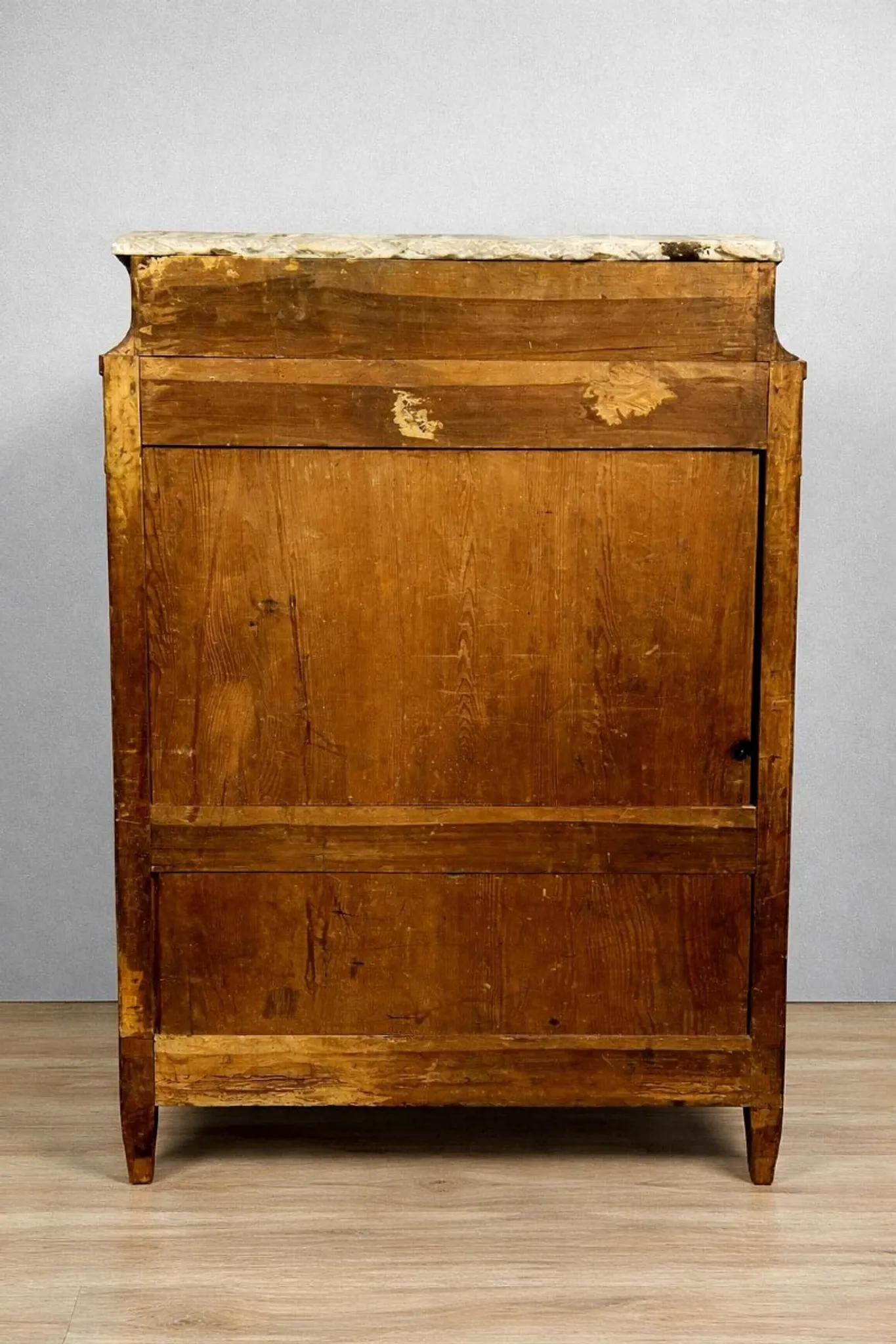 Secretary from the Louis XVI era in precious wood marquetry.