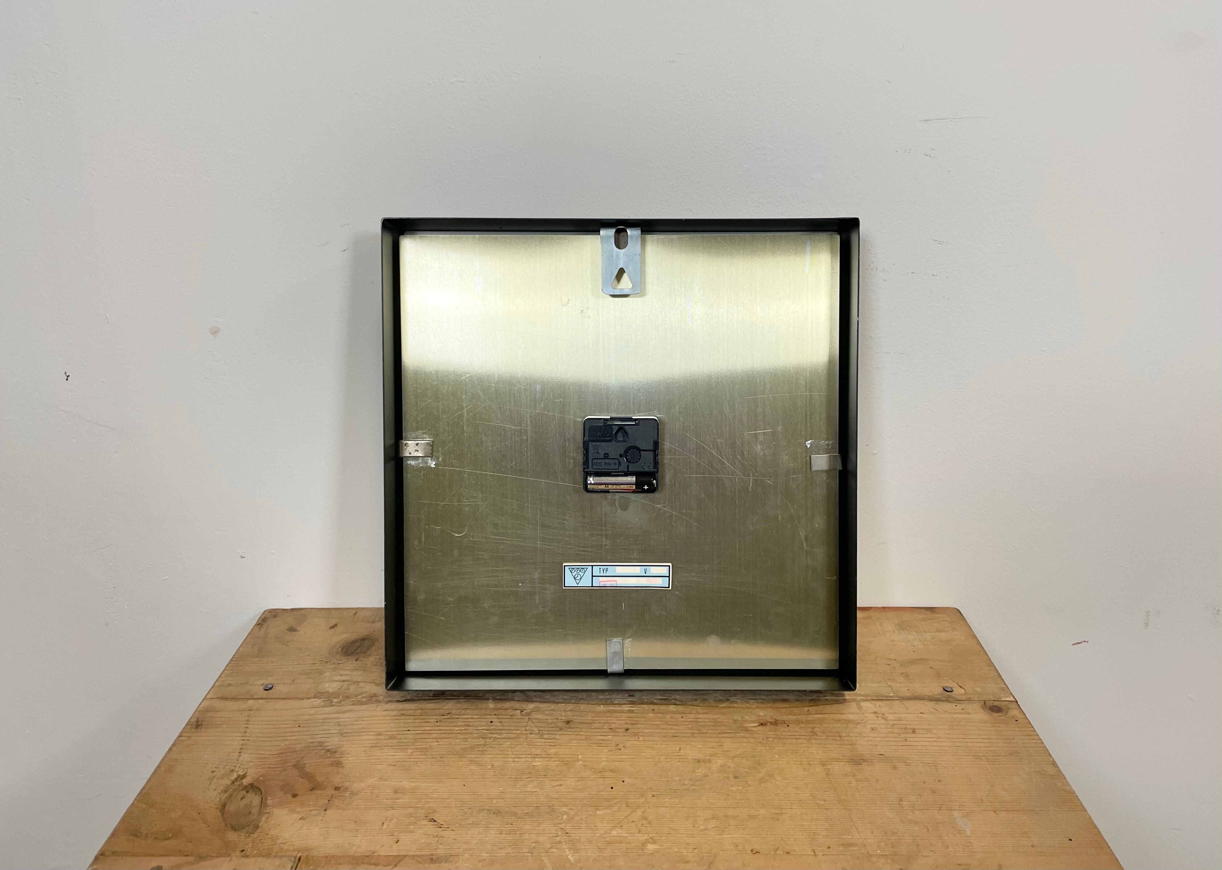 Black Industrial Square Wall Clock from Pragotron, 1970s