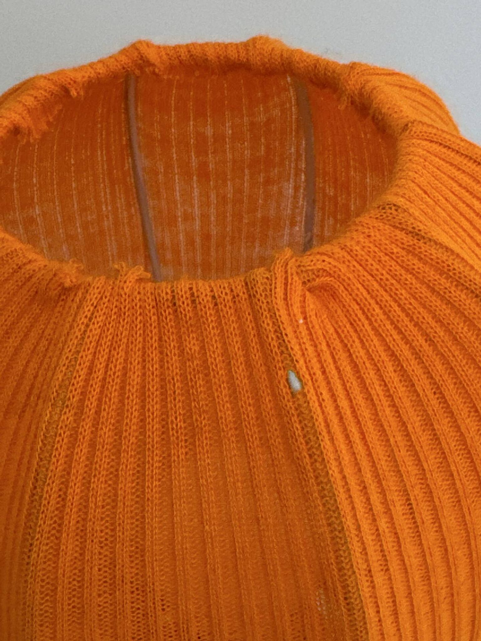 Lamp with a plastic base and a coloured fabric shade in Mid Century style.