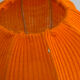 Lamp with a plastic base and a coloured fabric shade in Mid Century style.