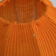 Lamp with a plastic base and a coloured fabric shade in Mid Century style.