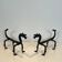 Pair of wrought iron fire dogs with dragons