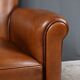 Paire de fauteuils club en cuir