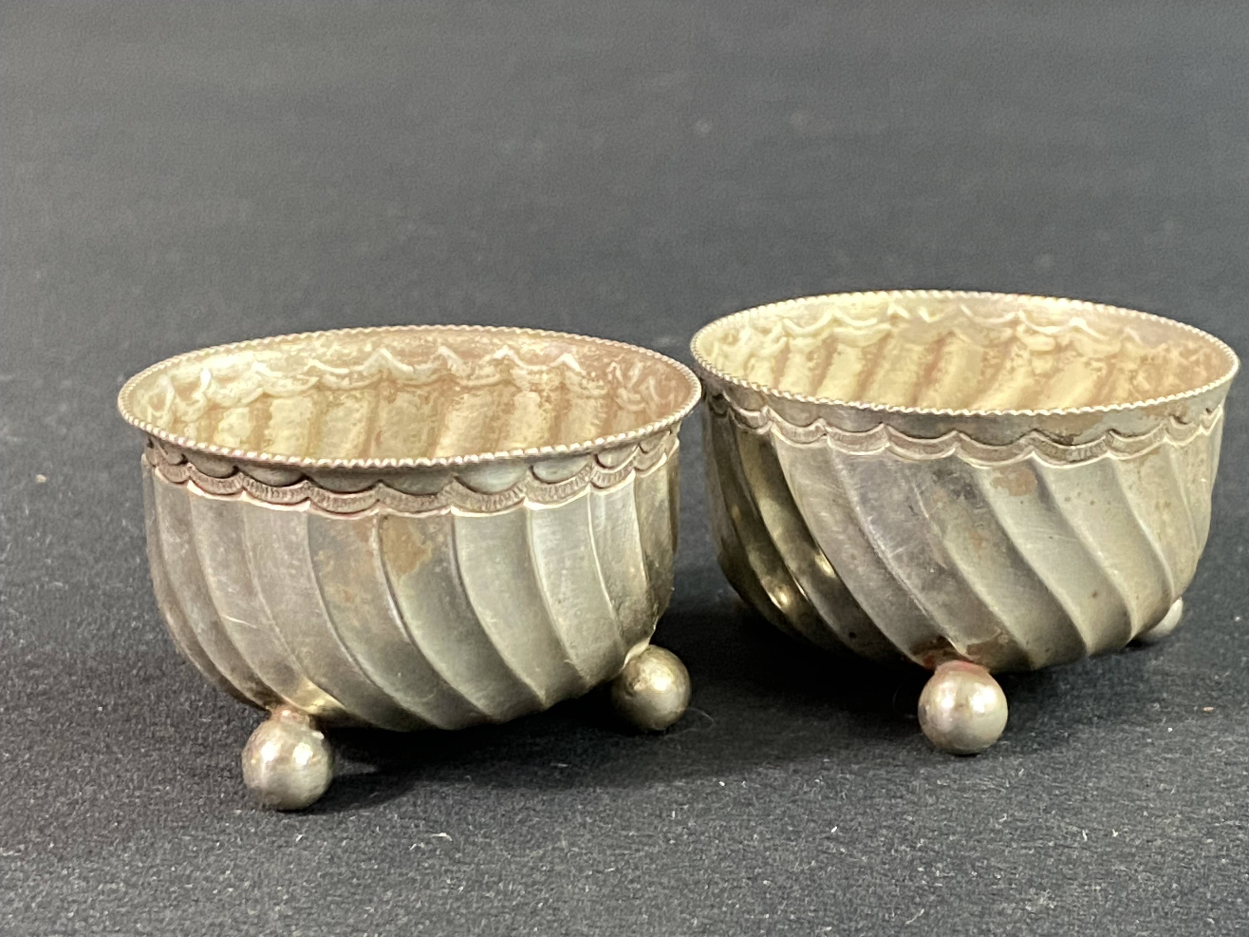 Pair of solid silver salt cellars with weevil hallmark