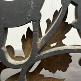 Blackened wooden shelf.