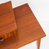 Vintage bedside table. Varnished wood. France, 1960s.