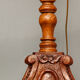 Carved wooden lamp, fiber shade