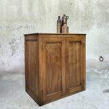 Small wooden sideboard with two doors.