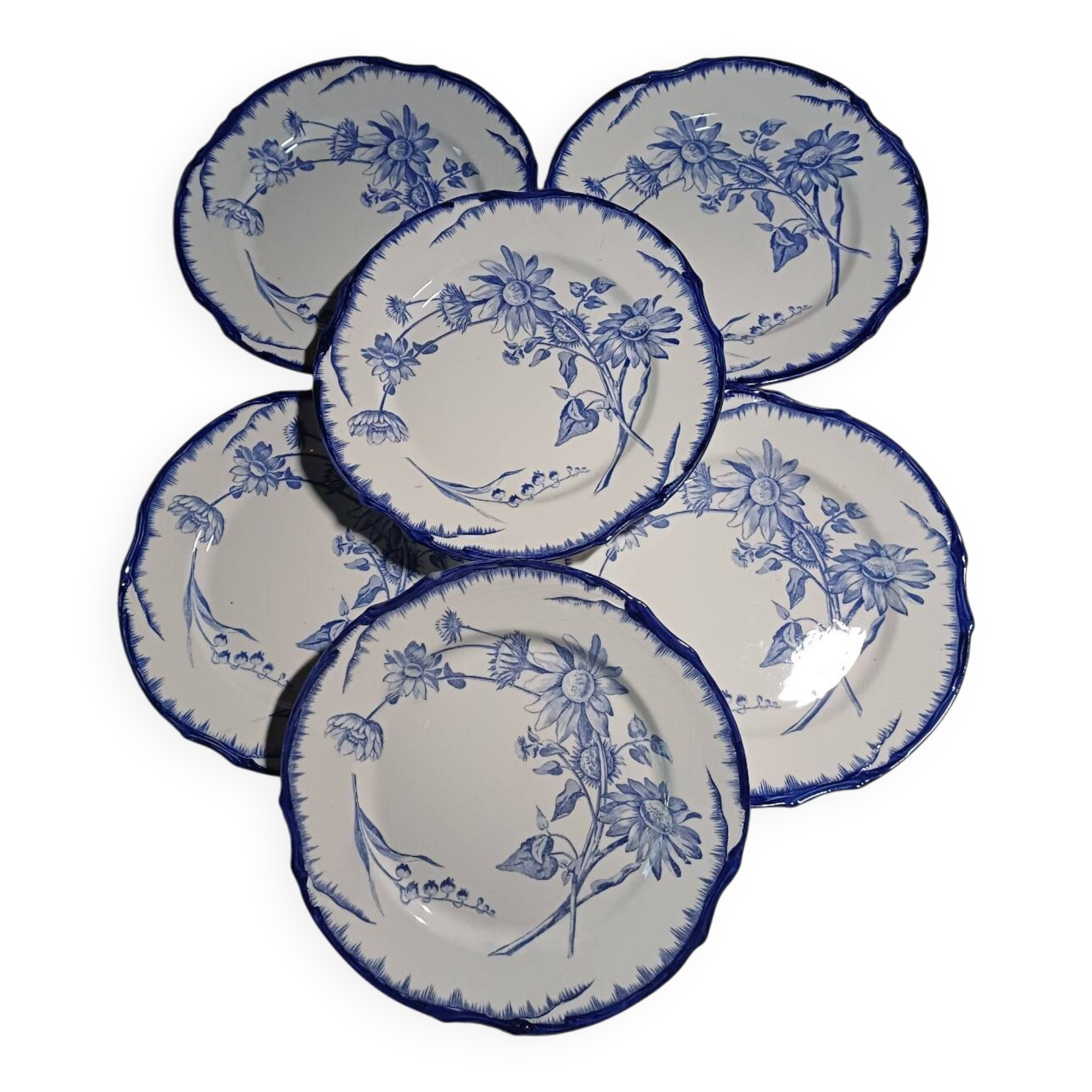 6 flat plates with floral decoration, T. de fer.