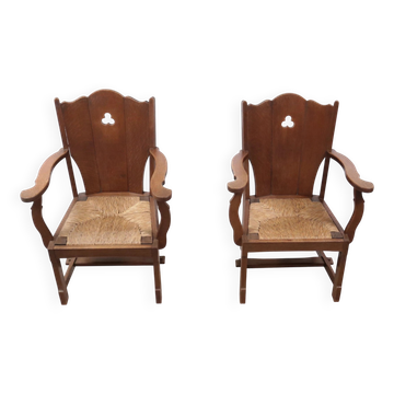 Pair of brutalist oak lounge chairs with rush seats – Netherlands