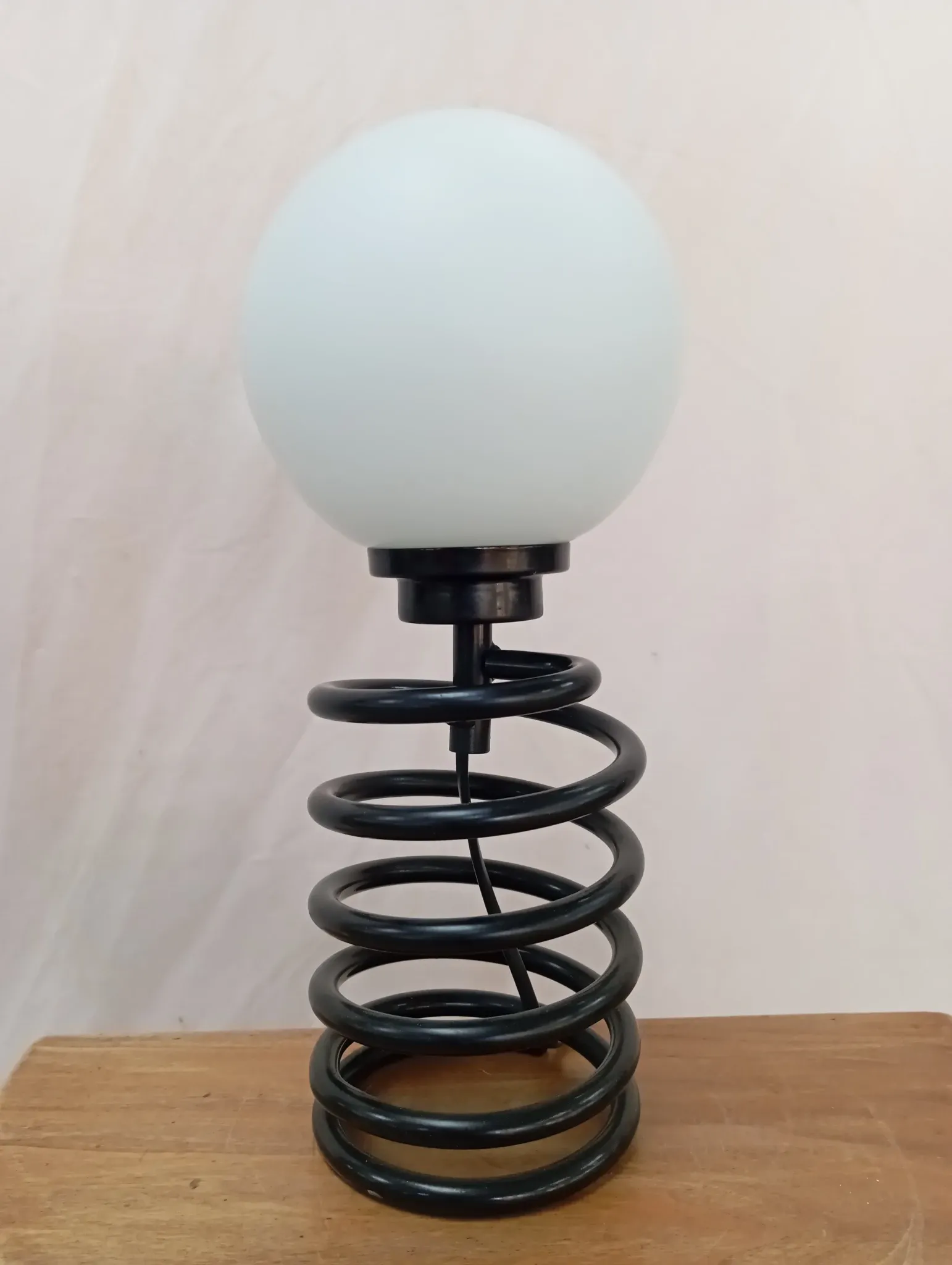 Spring lamp from the 1980s, design by Ingo Maurer.