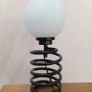Spring lamp from the 1980s, design by Ingo Maurer.