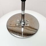 Minimalist suspended glass ball lamp from the vintage German space age by Glashütte Limburg, 1970s.