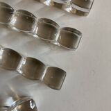 Set de 8 porte couteaux coussins modernistes en cristal sonnant 1940