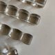 Set of 8 modernist crystal knife rests from the 1940s.