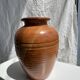 Large brown artisanal ceramic vase