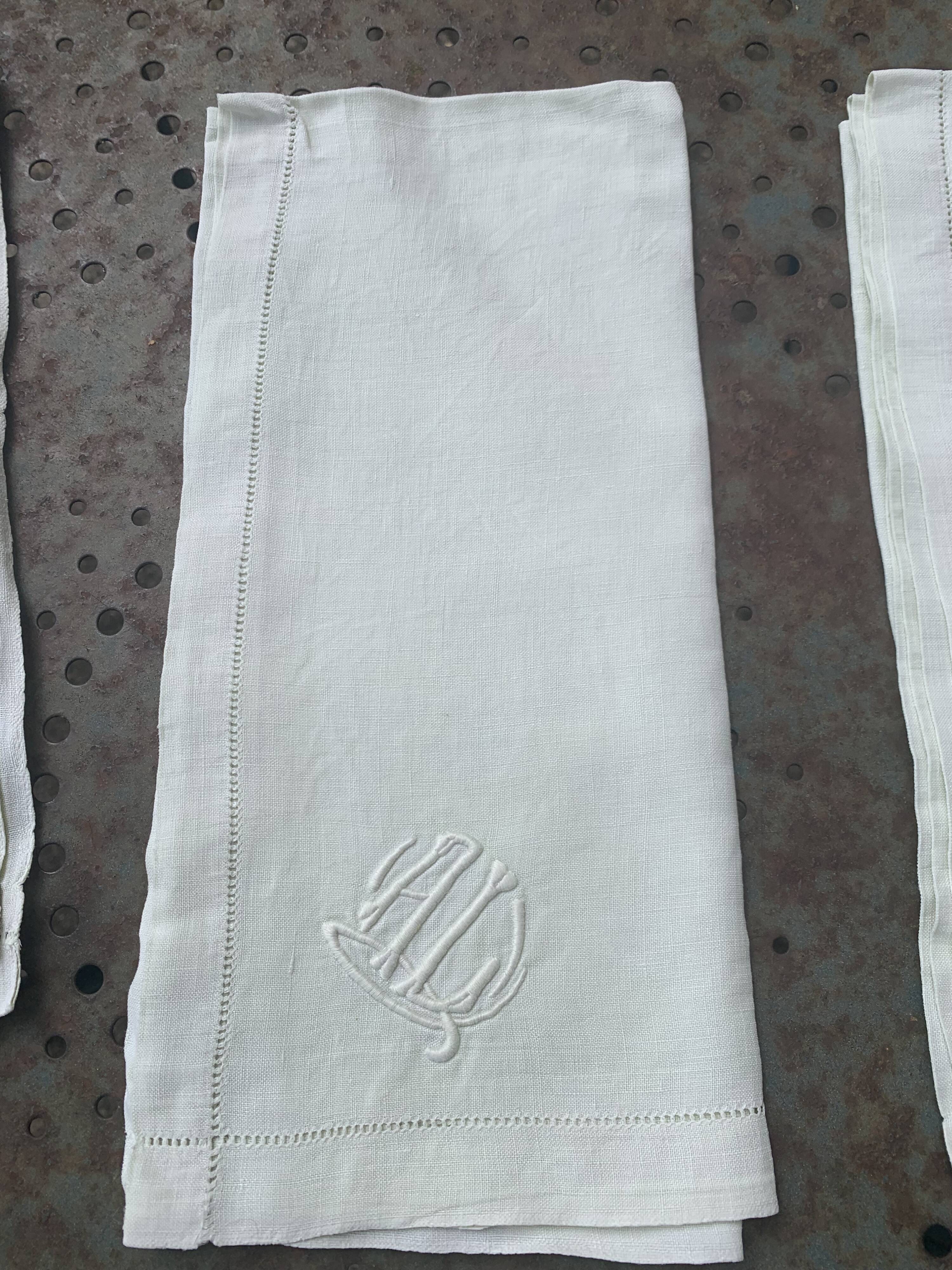 4 pastel yellow linen napkins, embroidered, AL monograms