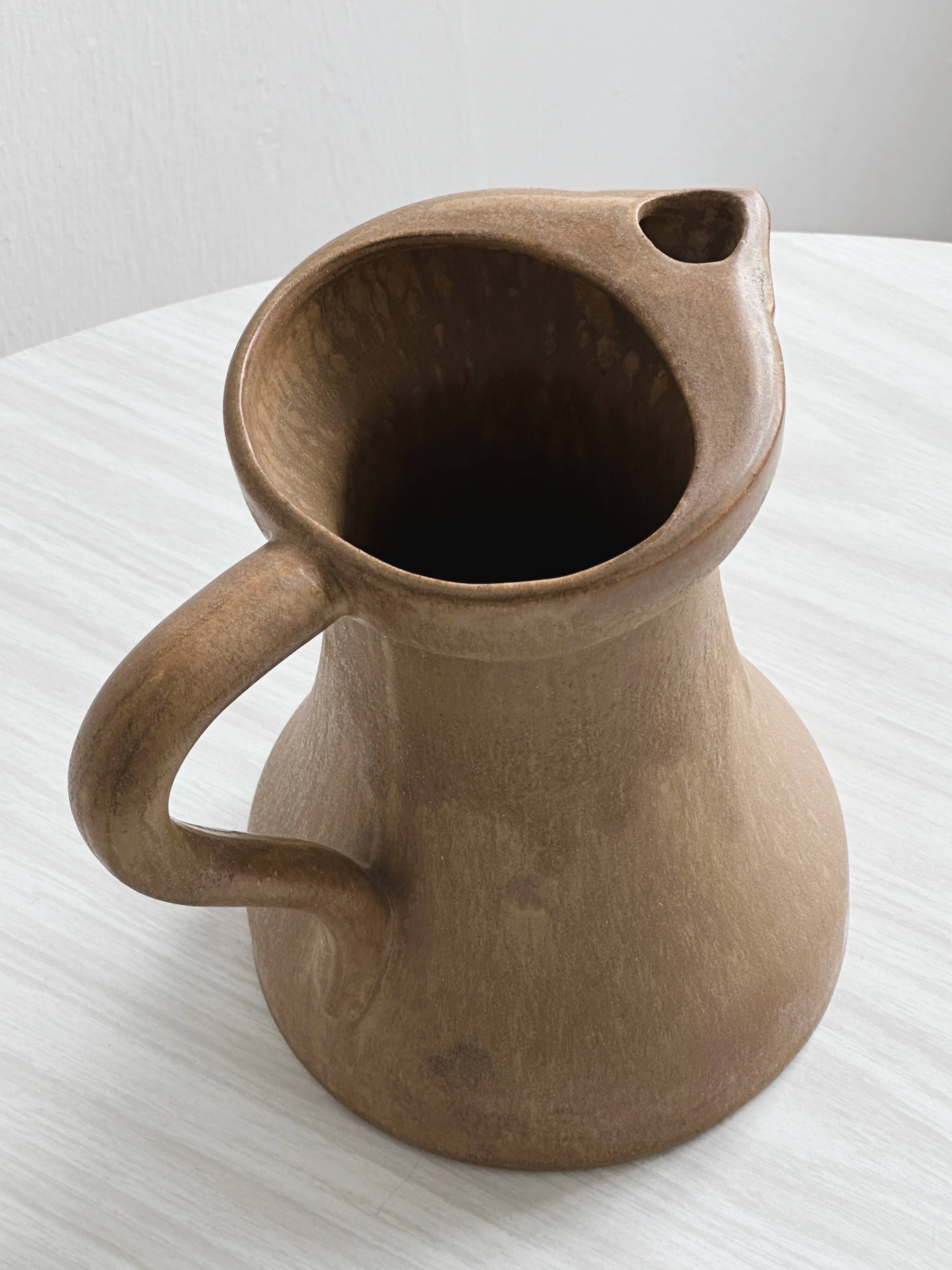 Stoneware pitcher - utensil pot.