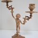 Pair of vintage golden brass cherub candlesticks