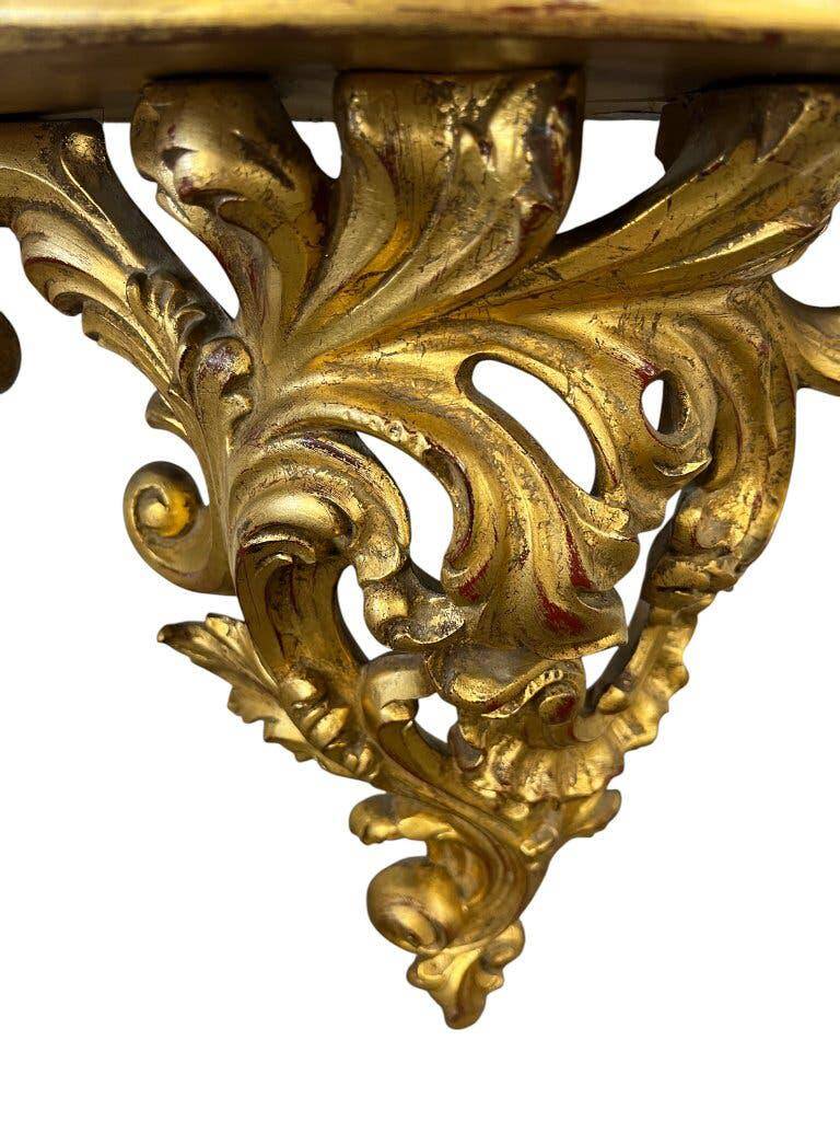 Baroque vintage gold wall-mounted console/table.