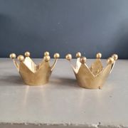 Pair of crown candle holders in brass