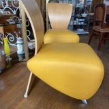Paire de fauteuils bobo en cuir.