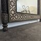 Orientalist mirror with bone inlays and hard stone cabochons.