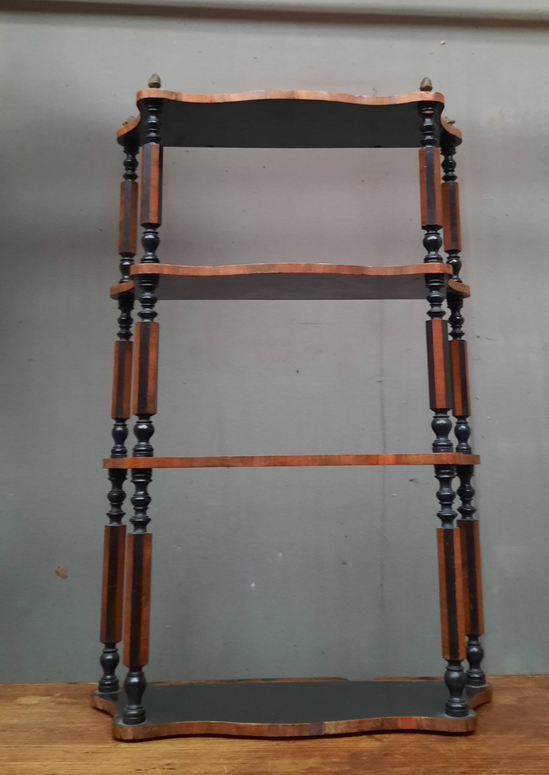 Blackened wooden wall shelf