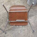 pair of vintage chairs against thermoformed plate