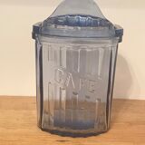 Old coffee pot in blue glass