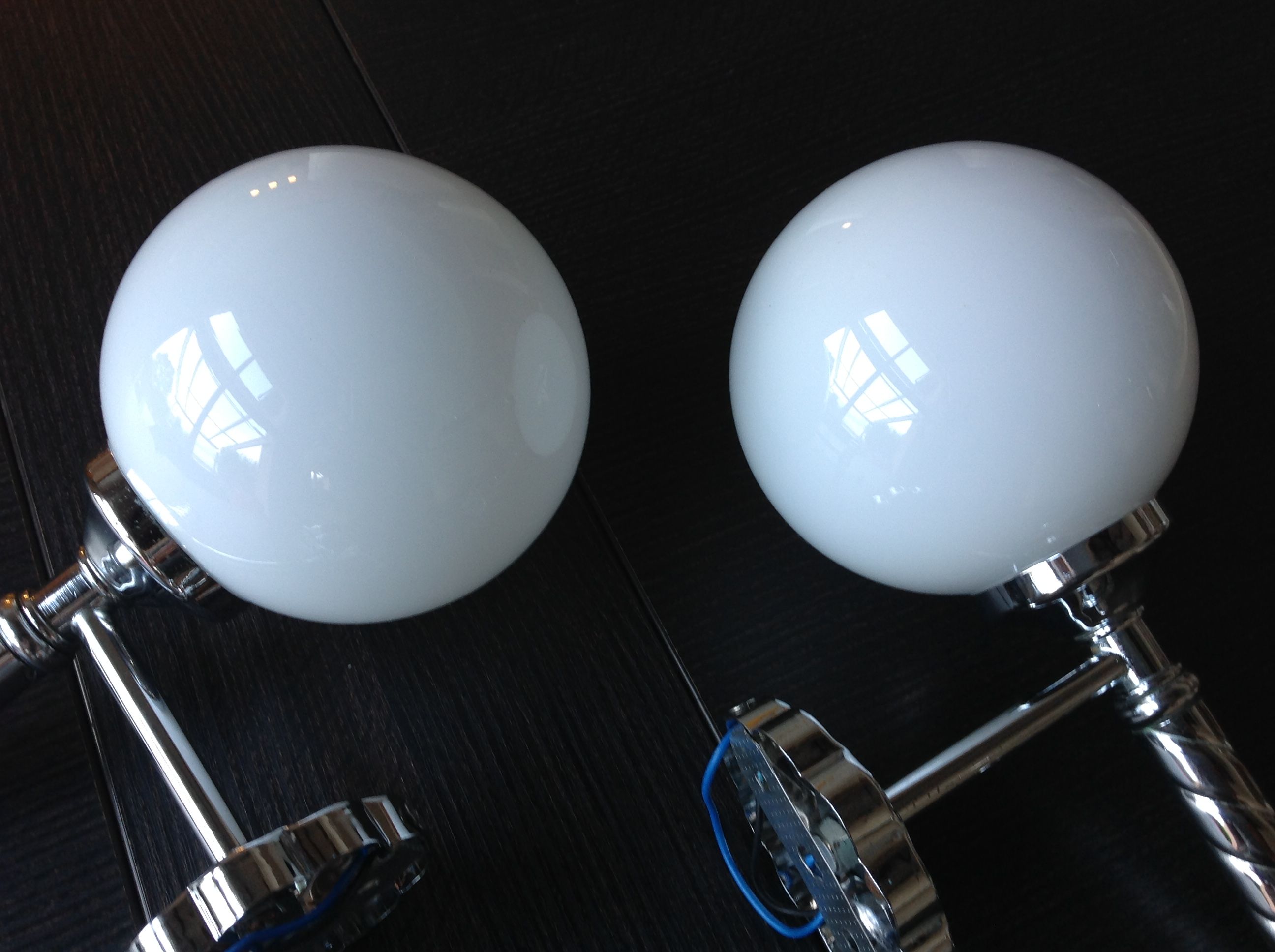 Pair of globe wall lamps in white opaline and chrome/vintage metal 70s