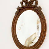 Louis XVI style oval knot mirror