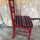 Red carved wood bedroom chair & vintage striped fabric seat