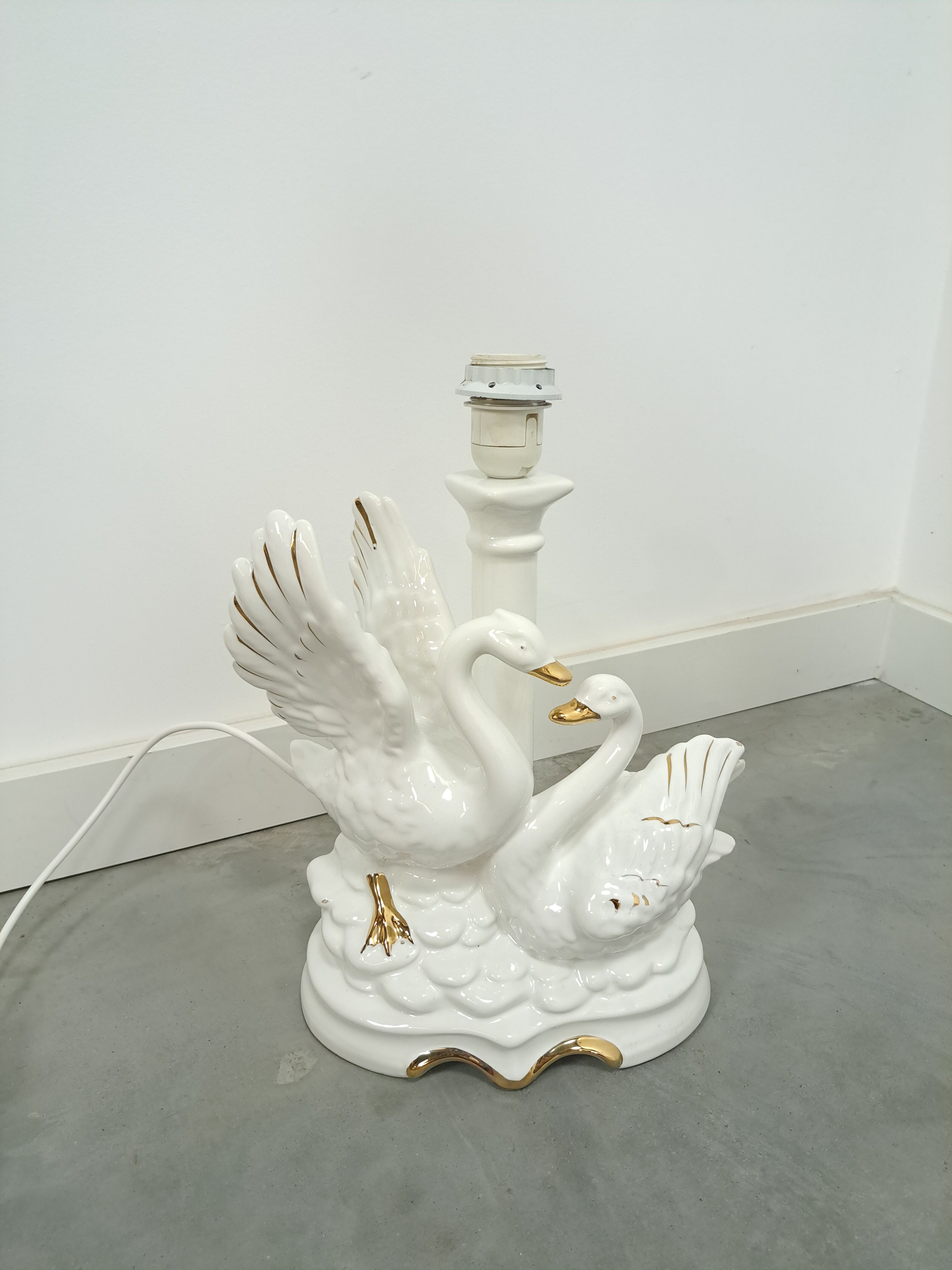 Porcelain lamp swans with vintage gold details